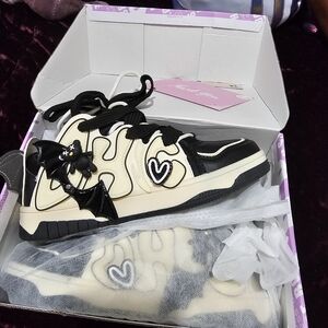 Halloween edition bat wings chunky sneakers. Size M10/W11/EU42